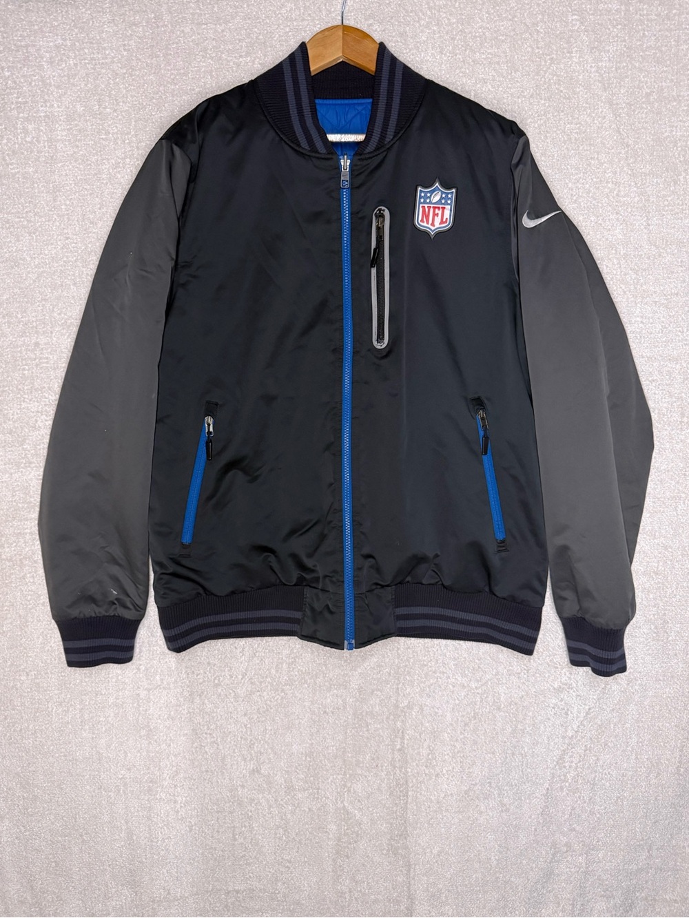 Nike NFL On Field Men's Reversible Quilted Bomber Jacket Large Black Blue